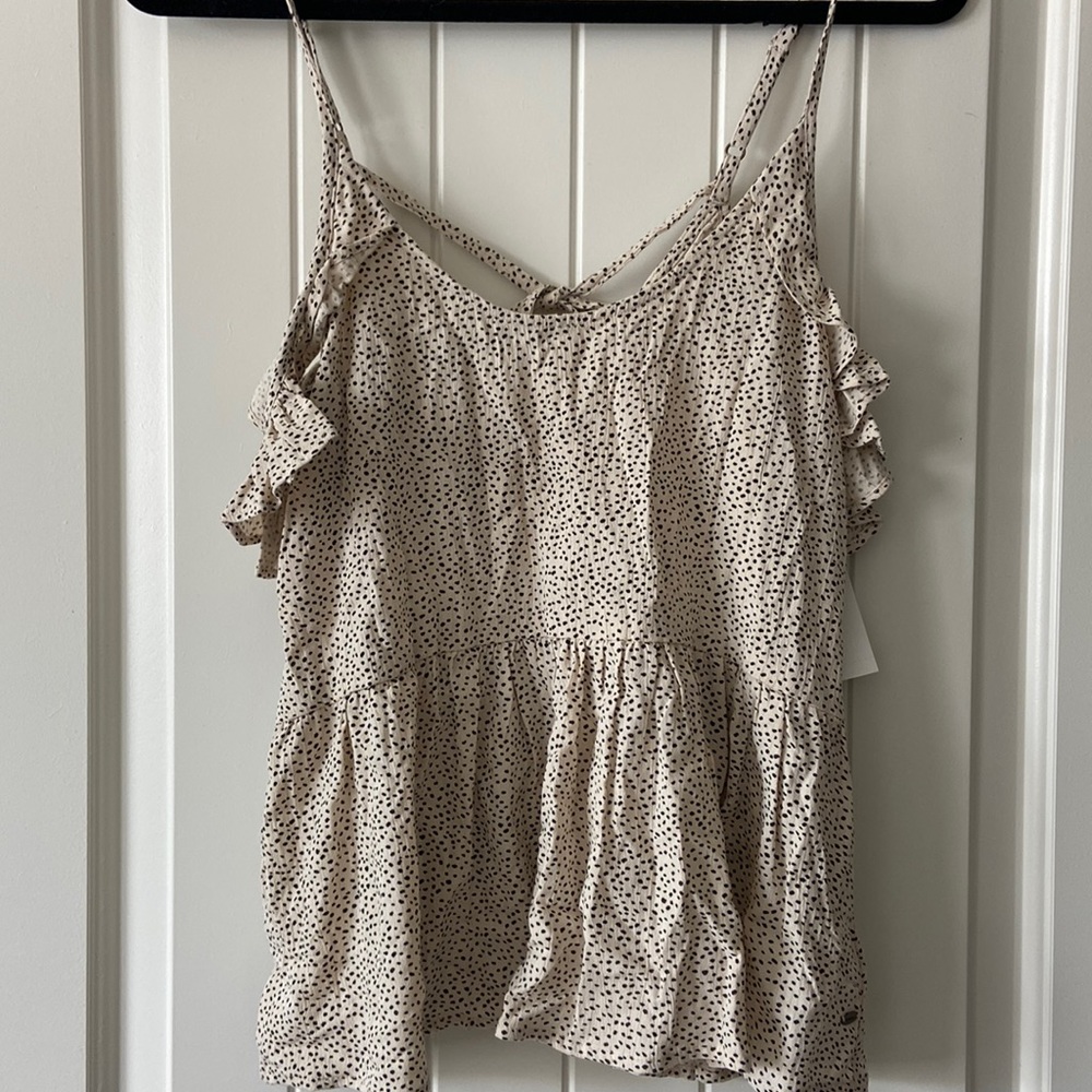 Polk a dot peplum tank top